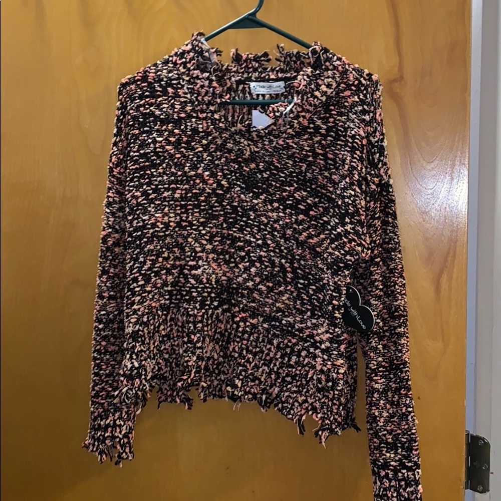 Distressed crop sweater